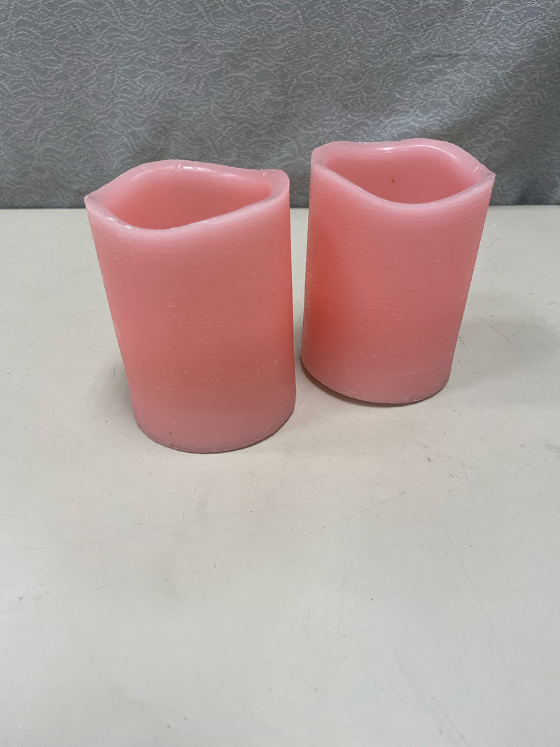 2 PINK FAUX CANDLES