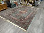 GREEN/RED ORNATE RUG