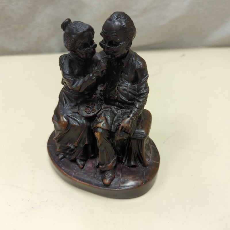 BROWN SENIOR COUPLE STATUE