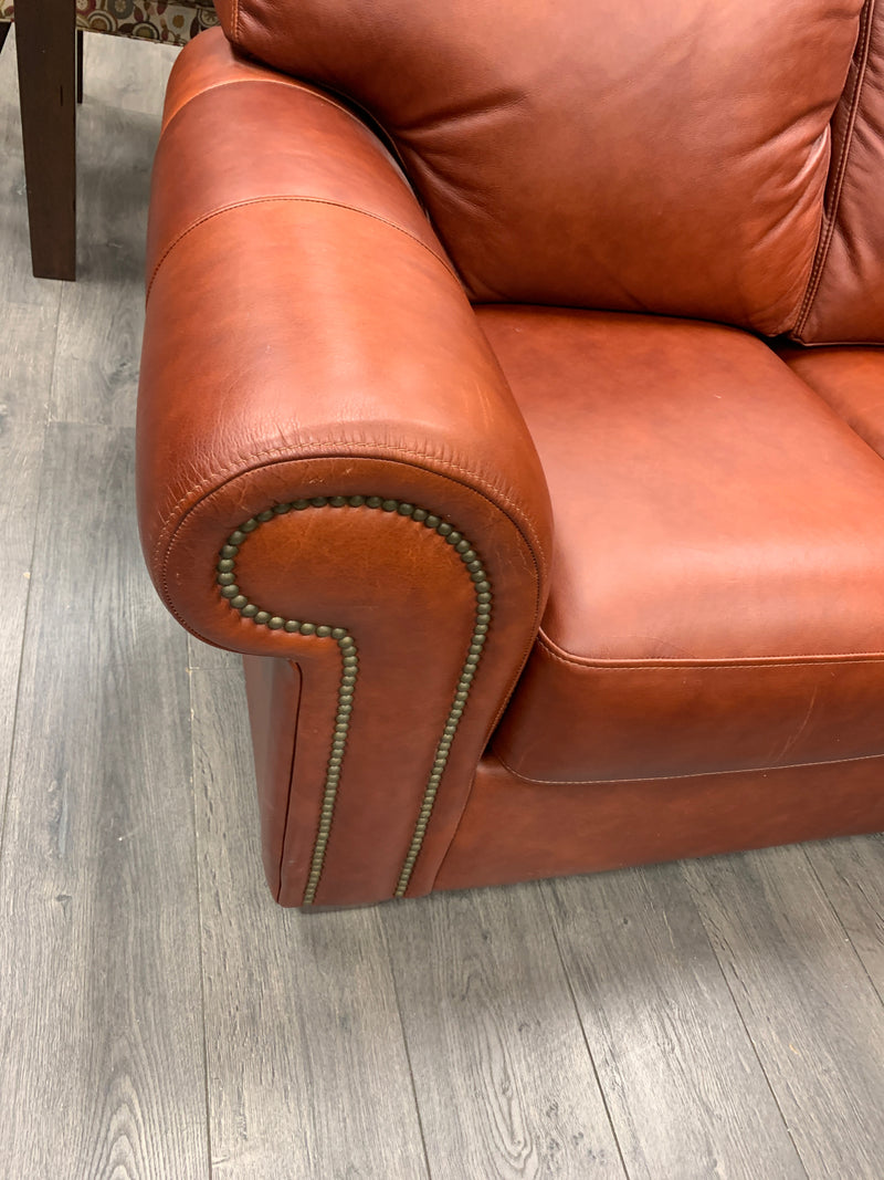 ORANGE LEATHER NAILHEAD SOFA