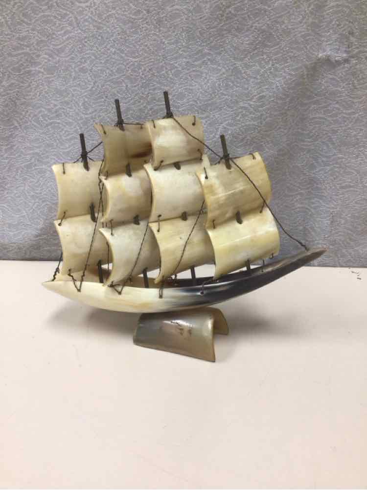 TUSK CARVED SAILBOAT