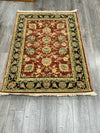 RED BLACK TAN RUG