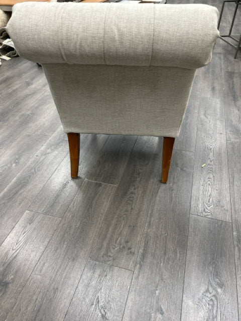 GREY BOLSTERED ARMLESS CHAIR