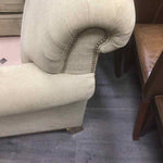 TAN UPHOLSTERED COUCH