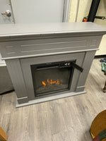 GREY FIREPLACE W/WOOD MANTLE