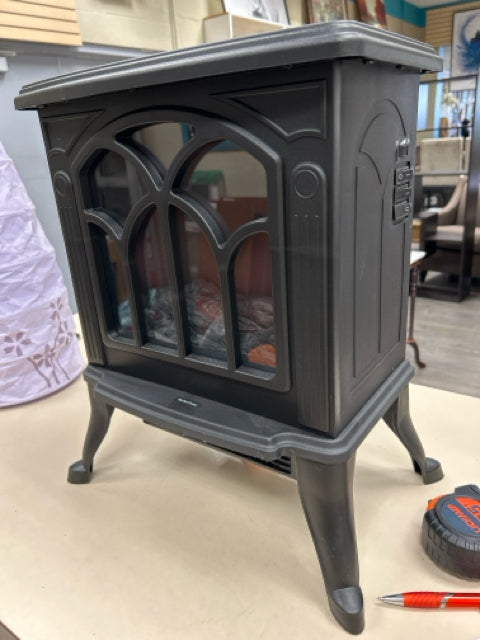 BLACK PLASTIC FIREPLACE