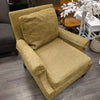 BROWN UPHOLSTERED ARMCHAIR