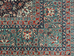 GREEN/RED ORNATE RUG