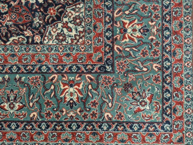 GREEN/RED ORNATE RUG