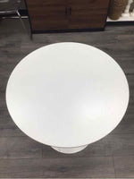 WHITE CIRCULAR TABLE