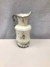 SMALL ORNATE FLORAL PITCHER