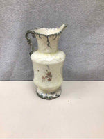 SMALL ORNATE FLORAL PITCHER