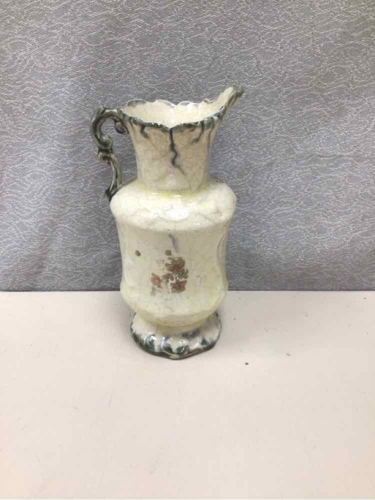 SMALL ORNATE FLORAL PITCHER