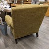 BROWN UPHOLSTERED ARMCHAIR