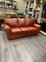 ORANGE LEATHER NAILHEAD SOFA