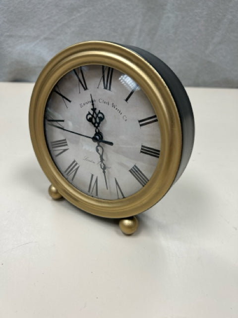 GOLD BLACK CLOCK ON STAND