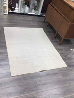 TEXTURED CREAM RUG