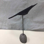 WOOD BIRD ON STONE STAND