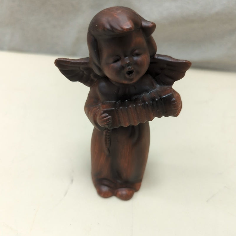 ASSORTED BROWN SINGING CHERUB