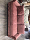 PINK UPHOLSTERED SOFA