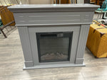 GREY FIREPLACE W/WOOD MANTLE