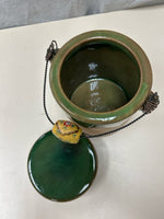 GREEN/TAN CERAMIC JAR W/HANDLE