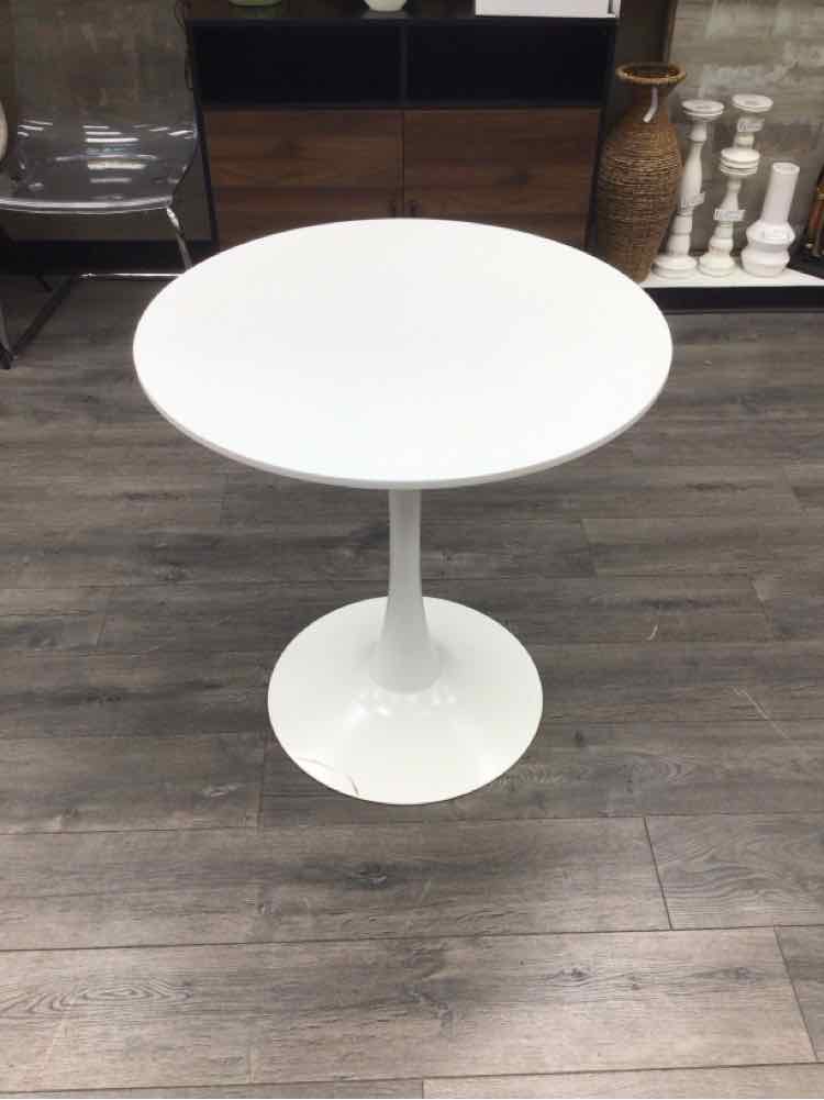 WHITE CIRCULAR TABLE