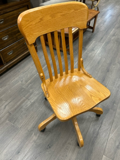 SOLID OAK DESK CHAIR ON WHEELS