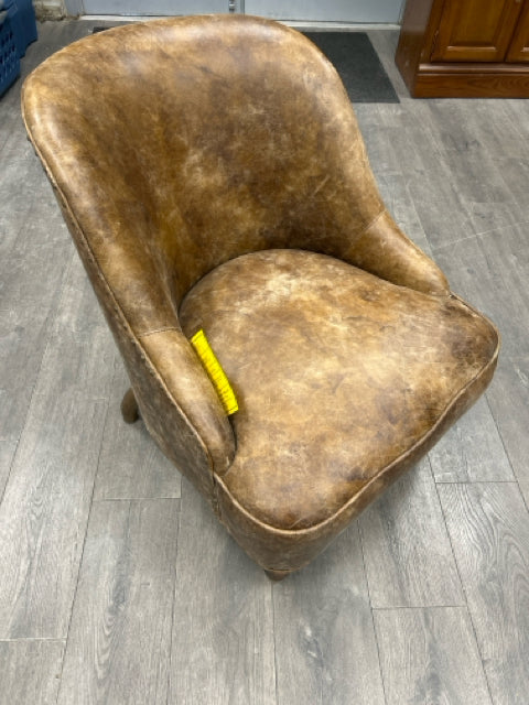 BROWN LEATHER CHAIR ON WHEELS