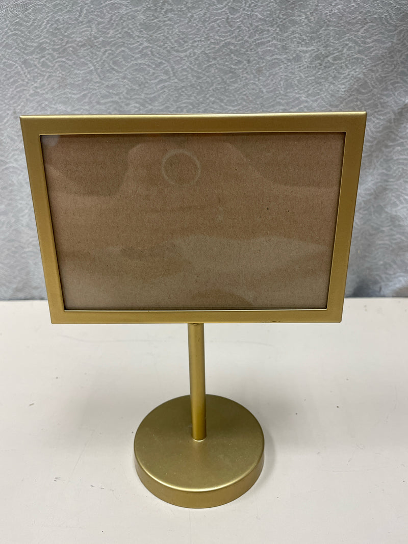 GOLD FRAME ON STAND