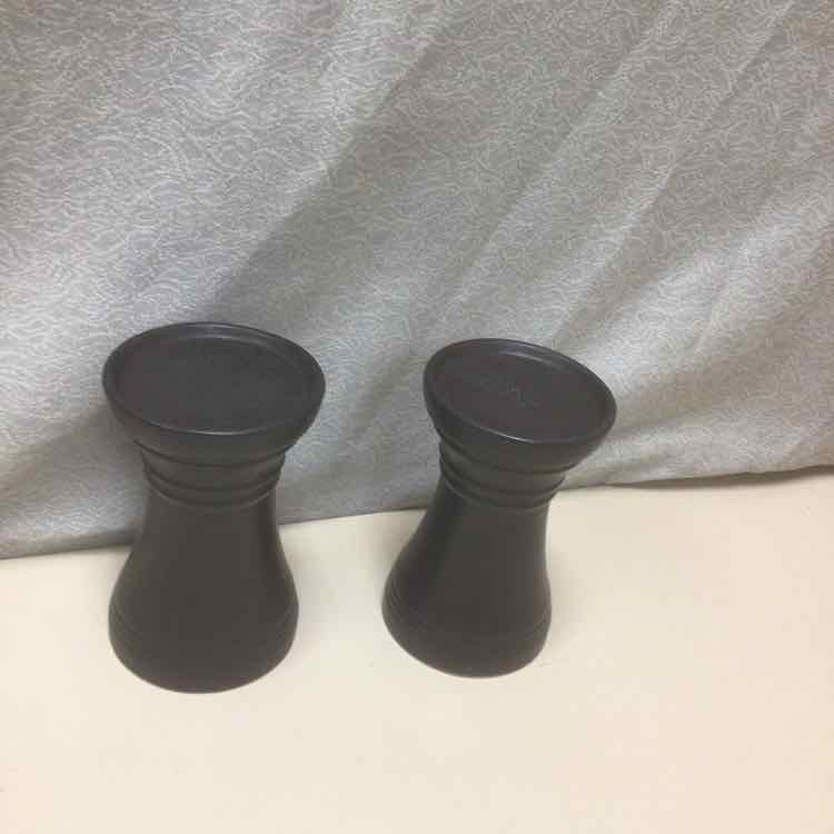 2 BLACK CANDLE HOLDERS