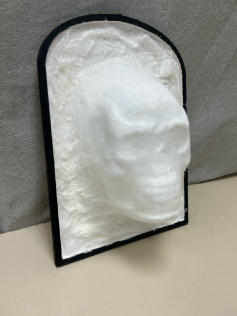 PAPER MACHE SKULL IN CLOTH HANGING