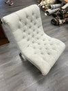 GREY BOLSTERED ARMLESS CHAIR