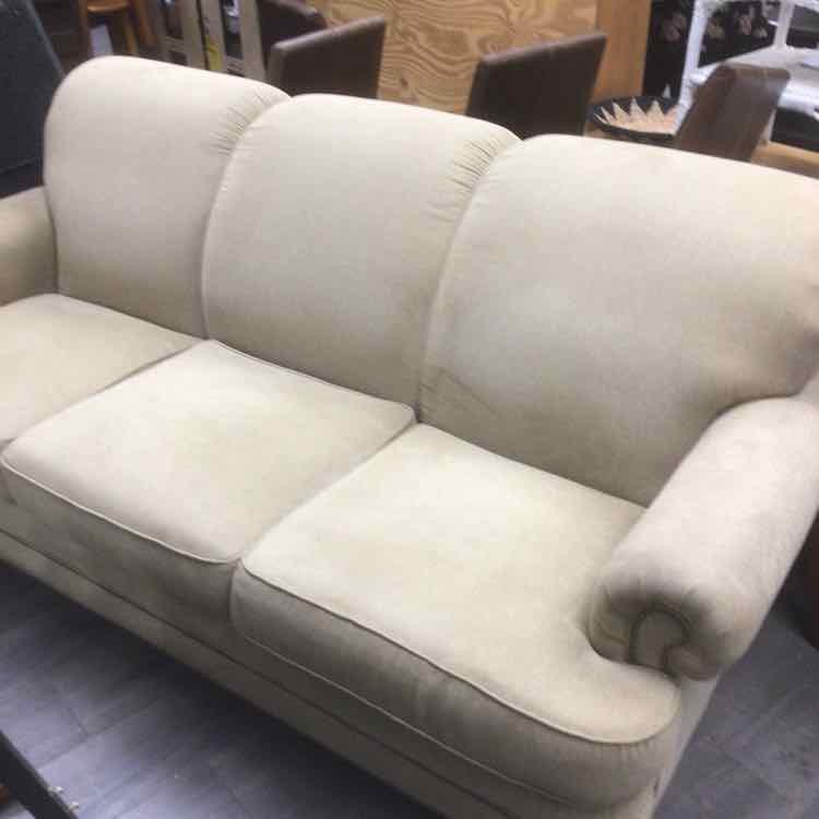 TAN UPHOLSTERED COUCH