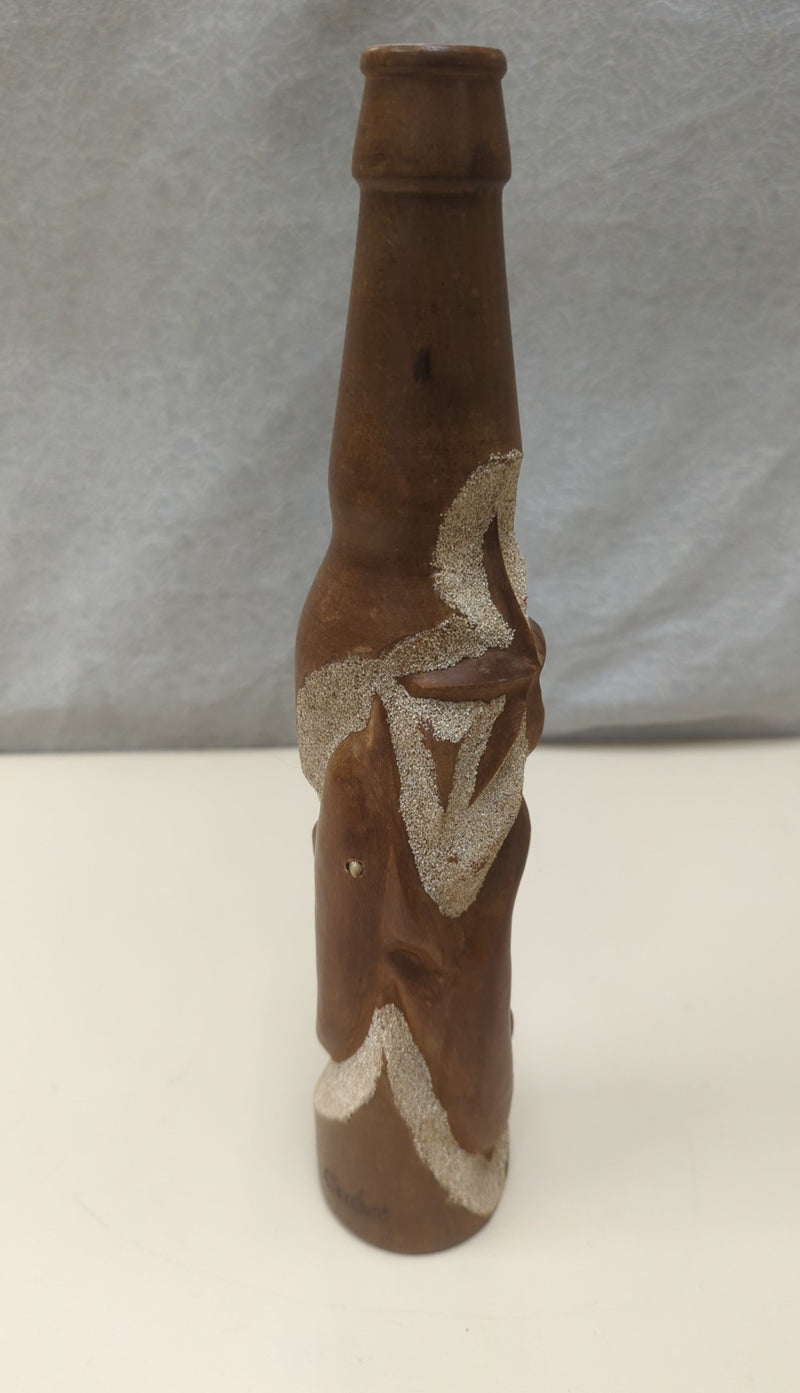 BROWN WOOD CARVED BOTTLE