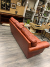 ORANGE LEATHER NAILHEAD SOFA