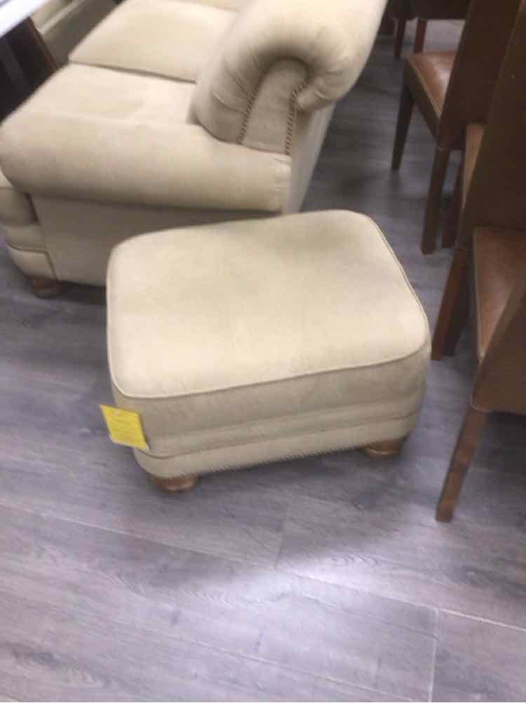 TAN UPHOLSTERED COUCH