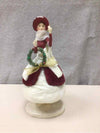 CAROLER W/ WREATH FIGURE