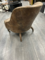 BROWN LEATHER CHAIR ON WHEELS