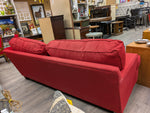RED UPHOLSTERED SOFA