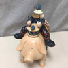 DRUMMER ON PIG W/FLAG