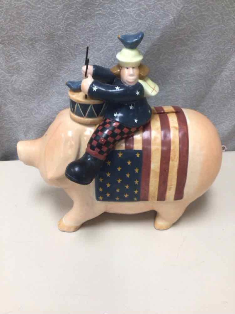 DRUMMER ON PIG W/FLAG