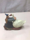 VINTAGE GIRL HUGGING GOOSE FIGURINE