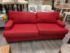 RED UPHOLSTERED SOFA