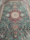 GREEN/RED ORNATE RUG