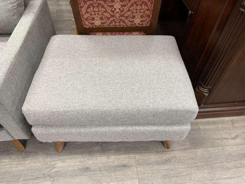 GRAY UPHOLSTERED OTTOMAN