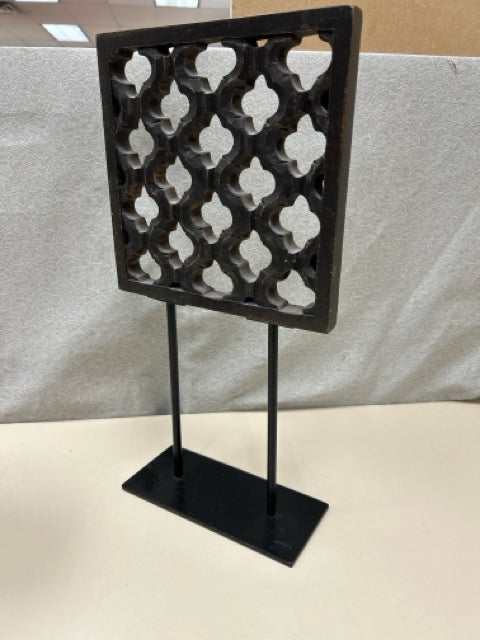 BLACK WOOD CUTOUT SCULPTURE