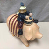 DRUMMER ON PIG W/FLAG