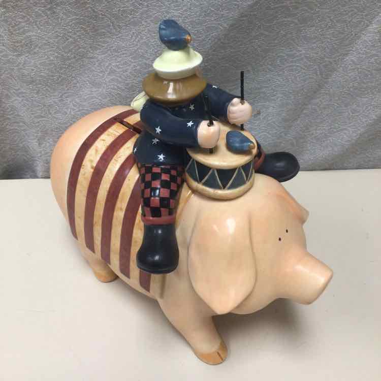 DRUMMER ON PIG W/FLAG