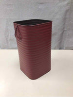 TALL RED METAL CONTAINER